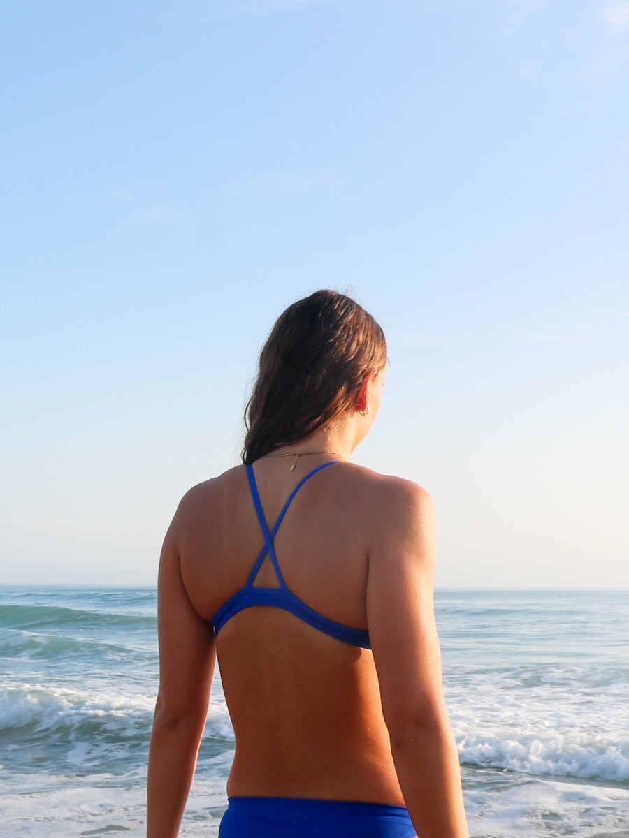 Back view of athletic cross-back JAYD Swimwear Kiama bikini top in Cobalt Blue.