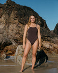 Athlete Soraya wears the Tallow fixed back one piece by JAYD Swimwear in the colour Cacao. Tallow offers tension distributing straps and sits slightly higher on the chest for more coverage.