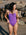 Madi wears the Riva one piece by JAYD Swimwear in the colour Murasaki. This piece is built for performance and is a tie-back.