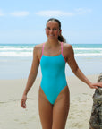 Front view of Zambia One Piece Athletic Swimsuit in Mykonos blue by JAYD Swimwear