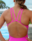 Back strap view of athletic swimsuit Apsley One Piece in Orchid by JAYD Swimwear