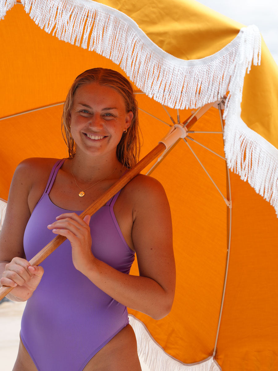 Front view of athletic swimsuit Finley One Piece in Lilac Haze by JAYD Swimwear