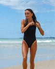 Front view of athletic swimsuit Siena One Piece in Black by JAYD Swimwear