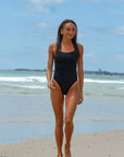 Front view of athletic swimsuit Siena One Piece in Black by JAYD Swimwear