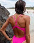 Back view of athletic swimsuit Siena One Piece in Pink Sorbet by JAYD Swimwear