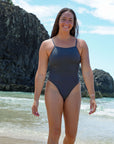 Front view of Tallow One Piece Athletic Swimsuit in Carbon by JAYD Swimwear