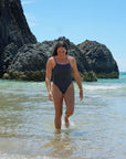 Front view of Tallow One Piece Athletic Swimsuit in Carbon by JAYD Swimwear