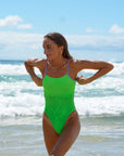 Front view of Zambia One Piece Athletic Swimsuit in Splice green by JAYD Swimwear