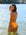 Back view of JAYD Swimwear's full-coverage athletic one-piece Tallow in Sunshine 