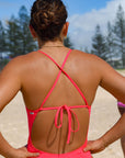 Close back view of JAYD Swimwear tie back athletic full coverage one piece: Riva in Fiesta