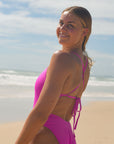 Back view of JAYD Swimwear tie back athletic full coverage one piece: Riva in Orchid