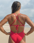 Back view of JAYD Swimwear tie back athletic full coverage one piece: Riva in Ruby