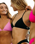 Side view of JAYD Swimwear athletic training bikini top, Triangle, in Black.