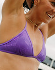 Side view of JAYD Swimwear athletic training bikini top, Triangle, in Lilac Haze.