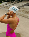 Side view of Tallow One Piece Athletic Swimsuit in Pink Sorbet by JAYD Swimwear