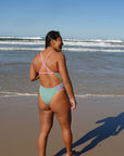 Athlete Sara wearing the fixed back Lennox contrasting one piece by JAYD Swimwear. Swimsuit is designed for performance.