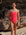 Athlete Kate wears the fixed back lennox one piece in the colour fiesta with contrasting mykonos strap detailing and hip cut-outs.