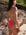 Athlete Kate wears the Lennox one piece by JAYD swimwear in the colour Fiesta with contrasting Mykonos straps.
