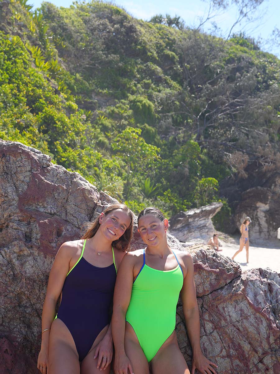 JAYD Swimwear athletes Madi & Molly in a summer daze, modelling the Ibiza One Piece swimsuit, showcasing it's perfect sporty, spicy, and full coverage functional fit.