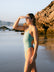 JAYD Swimwear athlete Emily Hollyman wearing the Matcha Lennox one piece swimsuit with contrasting storm shoulder straps and hip cut outs.