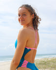 Jess wears JAYD Swimwear Lennox one piece swimsuit in Nordic.