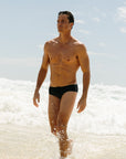 Side view of Ramshark Mens Briefs in Black by JAYD Swimwear.