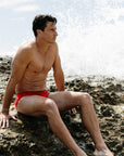 Side view of Ramshark Mens Briefs in Red by JAYD Swimwear.