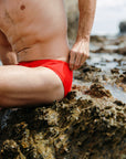 Close side view of Ramshark Mens Briefs in Red by JAYD Swimwear.