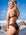 JAYD athlete Chloe wearing the high waist mid-coverage Tahiti Bikini Bottom in cacao brown.