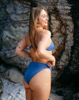 JAYD Swimwear model Cass wearing the mid-coverage, high waisted Tahiti Bikini Bottom