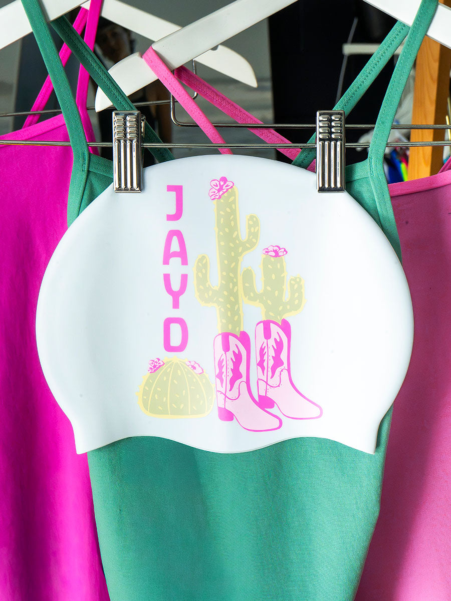 JAYD Swimwear swim cap featuring a cactus growing out of cowboy boots.